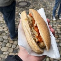 Tofu-Knacker mit Zwiebeln und scharfer Soße  at Tofu-Standpunkt - food truck in Freiburg