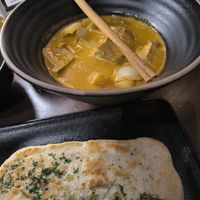 Masamam curry with homemade naan bread at Mercy Republic in Bangkok