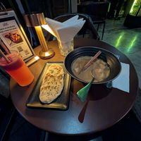 Massaman curry with garlic naan at Mercy Republic in Bangkok