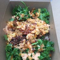 Burger box with salad instead of bun at The Cinnamon Snail in New York City