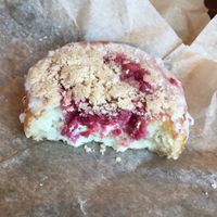 Raspberry cheesecake donut at The Cinnamon Snail in New York City