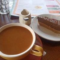 Coffee and vegan chocolate & raspberry torte at Bordo Lounge in Carlisle