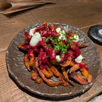 Sweet potato fries with vegan aioli. at Honest Greens - Arc de Triomf in Barcelona