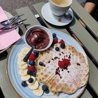 the Choconana waffle - a waffle served with a generous amount of vegan chocolate spread and banana/berries at Brandy & Cake in Vienna