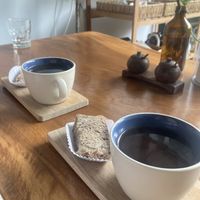 Amla&Matcha and Homemade Jamu (they came with a small slice of banana bread)   at O Baba Vegan in Denpasar