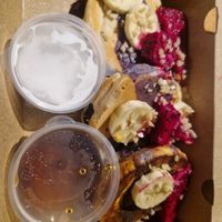 Choc stuffed pancakes, with coconut cream and syrup at O Baba Vegan in Denpasar