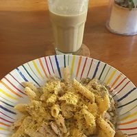 Creamy mushroom pasta with a pineapple, strawberry and mint smoothie at O Baba Vegan in Denpasar