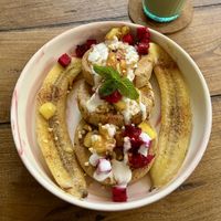 Pancake stack with pineapple and coconut cream + caramelized banana add on  at O Baba Vegan in Denpasar