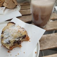 Inside of the cookie croissant was a cookie filling and a hot chocolate on the side at From Julia in Salzburg