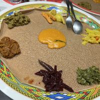 Selection of vegan curries on bread   at Sunshine Restaurant in Newcastle Upon Tyne