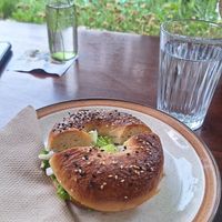 homemade bagel with cashew cream cheese at Backwoods Bakery in Dharamshala