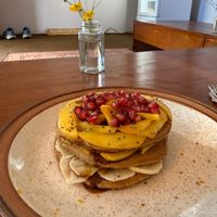Pancakes with mango at Backwoods Bakery in Dharamshala