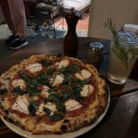 Vegan pizza with macadamia cream at Cafe Zorba in Medellin