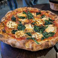 Delicious spinach pizza at Cafe Zorba in Medellin