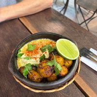 Sizzling papas bravas at Cafe Zorba in Medellin