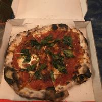 Espinaca pizza with vegan cheese made from macademia. at Cafe Zorba in Medellin