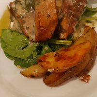 Seitan con spinaci at Tomatica Resistente in Turin