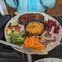 Iyam Bayeldi with salad and bulgur pilaf at Mila Loughton in Loughton