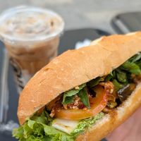 Vegan spicy tofu and vietnamese coffee with nut milk at Banh Mi Xanh in Ho Chi Minh City