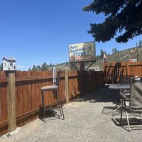 Patio and sign  at Fort Spokane Store & Restaurant  in Davenport
