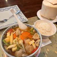 Tom yum soup and steamed rice with coconut juice   at Ban Khun Mae in Bangkok