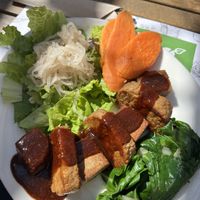 Mega protein plate - tempeh and smoked tofu in bbq sauce with boiled sweet potatoes, steamed greens and pickled cabbage  at Zrno Bio Bistro in Zagreb