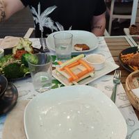 A basketull of homemade bread! The most amazing tofu on the planet with some of the best dipping sauces I ever tasted. at Zrno Bio Bistro in Zagreb