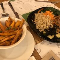 Sweet potato fries and Makro plate at Zrno Bio Bistro in Zagreb