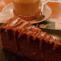 Chocolate cake and pumpkin spice latte  at Zrno Bio Bistro in Zagreb