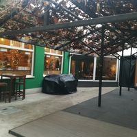 Restaurant is located a little bit hidden in the yard at Zrno Bio Bistro in Zagreb