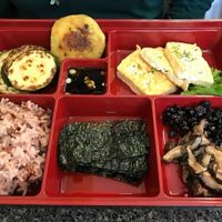 Tofu Royal Sampler Box: Grilled tofu, zucchini, eggplant, soybeans, roast seaweed, shiitake mushroom, mung bean pancake & steamed rice or brown rice. at Mark's Kitchen in Takoma Park