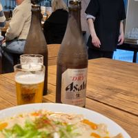 Nice big bottled beers and the waiter at Menya Shirakawa Bettei in Gifu