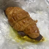 Croissant breakfast sandwich  at Liberation Kitchen in Chicago