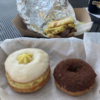 Cream filled donut, chocolate, and breakfast sandwich   at Liberation Kitchen in Chicago