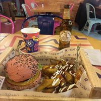 Parmigiana burger, patatas, beer  at Flower Burger in Padua