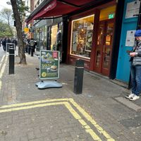 Facade on quiet pedestrian street  at Keep Chaating in London