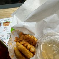 Seasoned waffle fries. They call them something else I don’t recall but we’re great. Sorry, picture was taken post me stealing a fry and then I realized “pictures!"  at Falafel Brothers - Harajuku in Tokyo