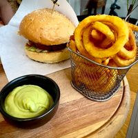 Simple but great burger! Their curly fries and guacamole were really good too! at REDEFINE -  Soul Food in Salzburg