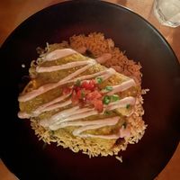 Vegan enchiladas with sweet potato and black beans, topped with a veg creama. Delicious!  at Alto Cinco in Syracuse