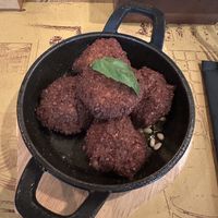 Vegan chickpea balls (labeled Vegane on menu)  at Taverna 51 in Rome