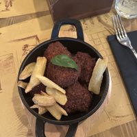 Added French fries (super fun crispy texture, hollow in middle)  at Taverna 51 in Rome