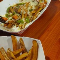 Fries with vegetables and cheese. at Oark General Store in Oark