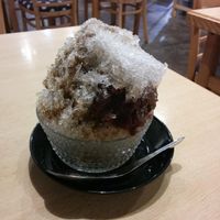 This is a shaved ice dessert with green tea and red bean. SO good! This was not on the main menu. We asked about it after seeing someone else in the restaurant have one of these.  at Komaki Shokudo in Tokyo