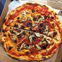 LA ROSSA -(No cheese)
Black olives, capers, oregano, and special tomato sauce at Duetto Pizza and Gelato in Key West