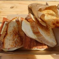 Bac'n + egg toastie $16.00, Potato borek $4.00 at Bean Brewed - Pop Up in Melbourne