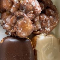 Apple Fritters, Maple Donut, Chocolate Donut  at Donut Land in Tualatin