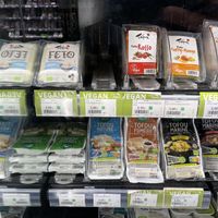 Lots of different types of tofu and sriram  at Le Retour a la Terre Rive Droite in Paris