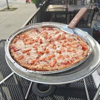 Vegan crust and vegan cheese pizza with tomatoes at Bourbon House Pizza in Newport