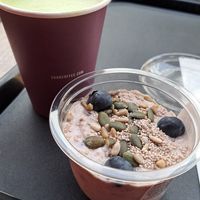 Very berry bircher & matcha latte at LIS - SOHO Coffee - T1 in Lisbon