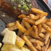 Jerk chkn with spiced fries and pineapple   at Turtle Bay in Salford